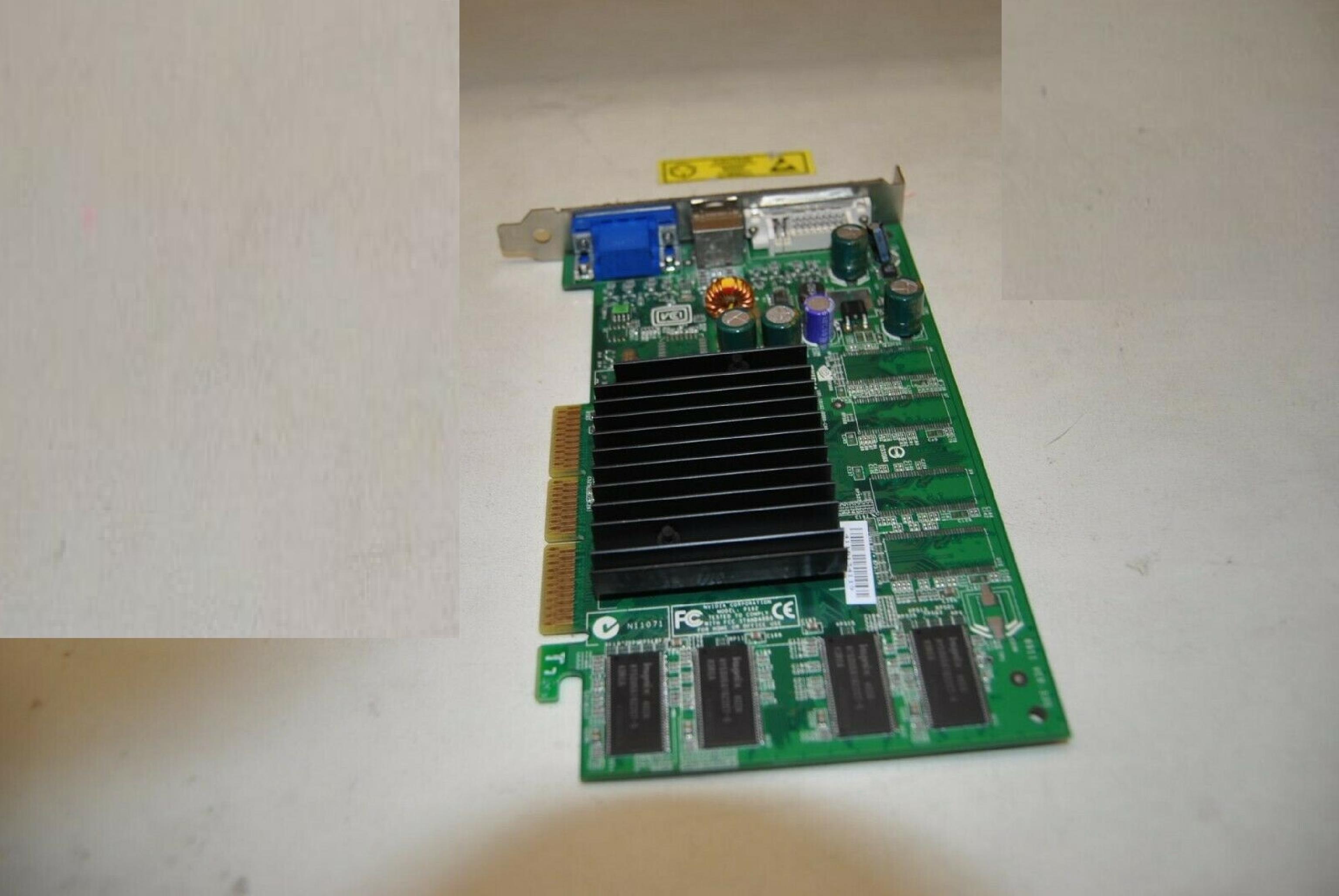 NVIDIA 8911 VER:330 128MB AGP VIDEO CARD WITH DVI VGA AND SVIDEO OUTPUTS 64MB