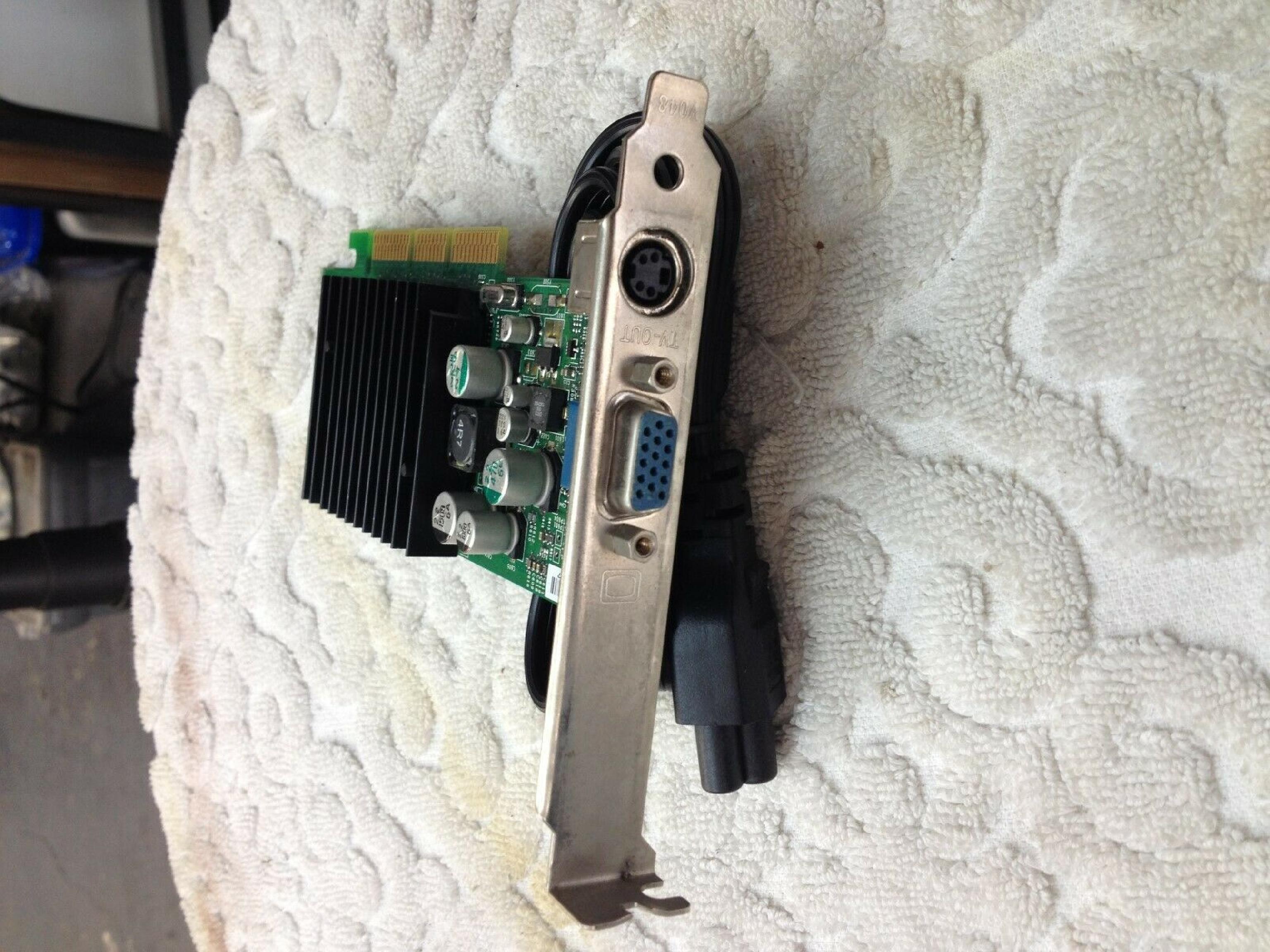 NVIDIA E96016 128MB AGP VIDEO CARD WITH DVI VGA AND SVIDEO OUTPUTS