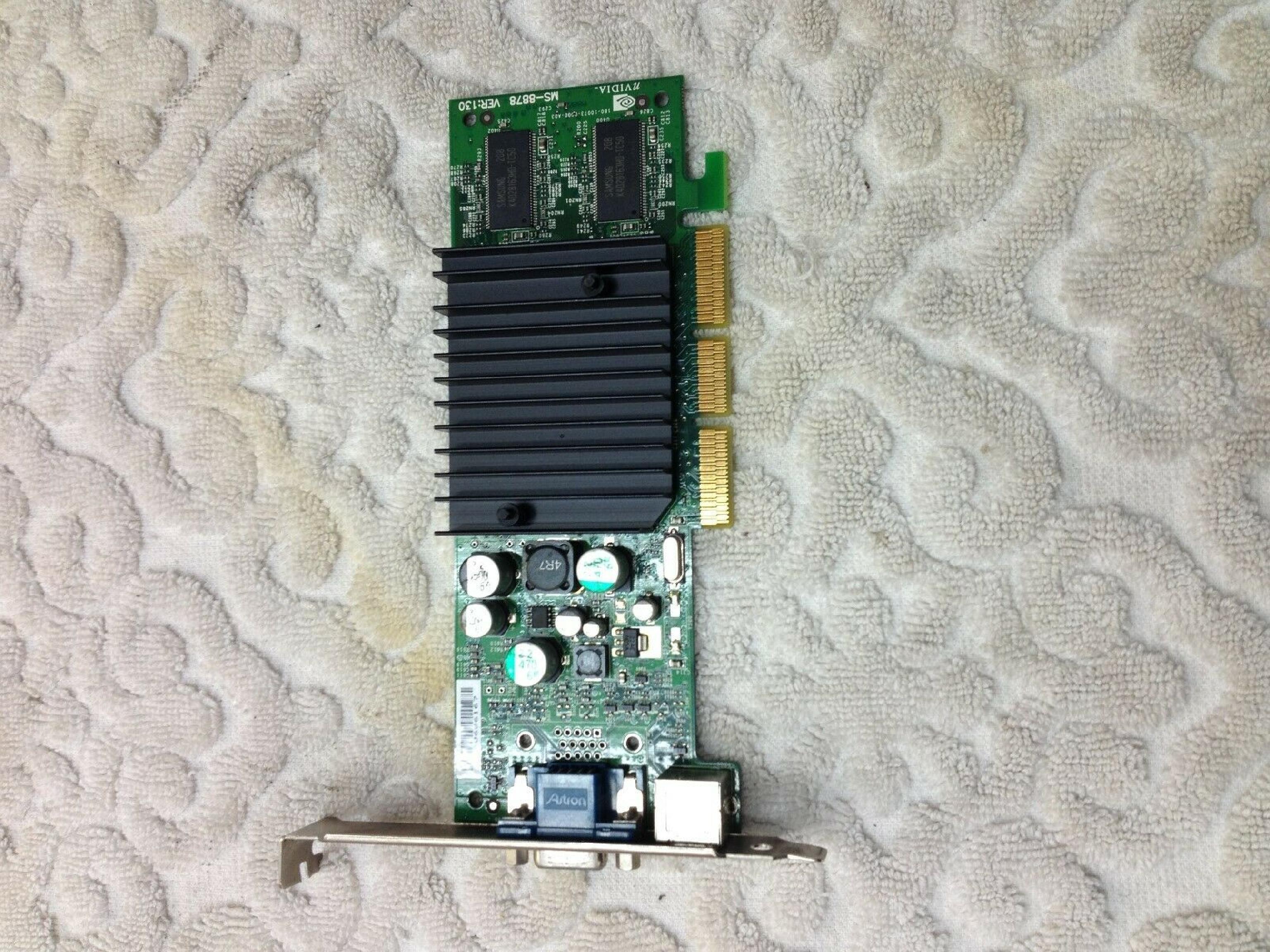 NVIDIA E96016 128MB AGP VIDEO CARD WITH DVI VGA AND SVIDEO OUTPUTS